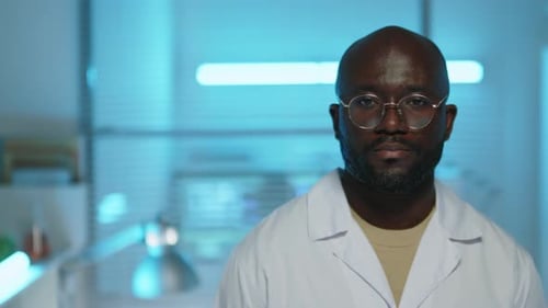 Portrait of African American Male Scientist at Workplace