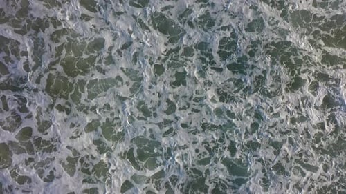 Amazing Top Down Aerial View of Blue Ocean Waves Water Ripples and Foam