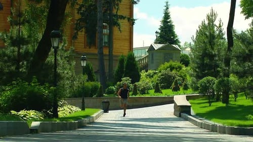 Man Run on Park Road. Male Runner Running in On