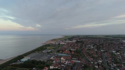 Coastal sunset on the popular seaside holiday resort of Skegness on the east coast of england. Warm
