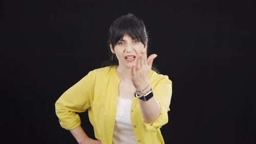 Woman getting angry at camera.