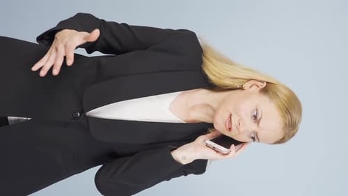 Woman Talks on Smartphone, Gesturing