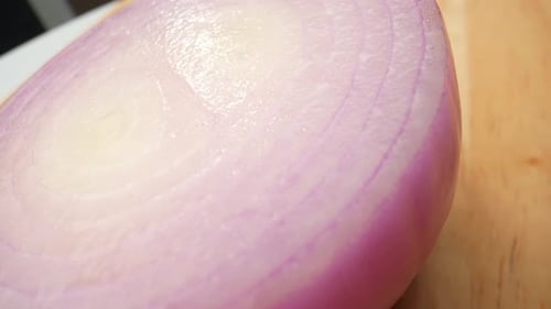 Vibrant and captivating, red onions shine under a macro lens