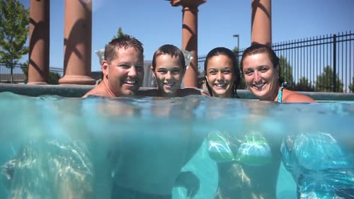 Family in the Pool 13-15 Years