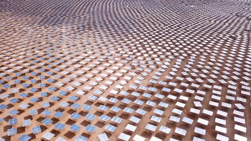 Solar power plant mirrors that focus sun rays upon a collector producing renewable energy