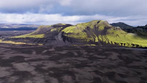 Aerial view of volcanic mountains at sunset, Iceland.