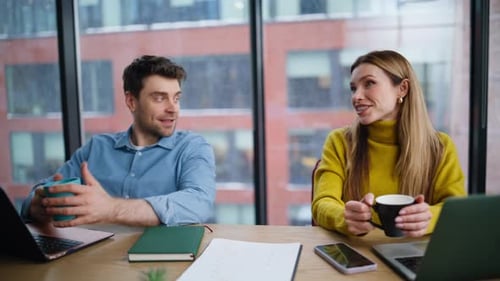 Friendly Coworkers Talking Office Closeup Smiling Woman Man Holding Coffee Cups