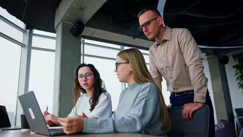 Team Working Together in Modern Office