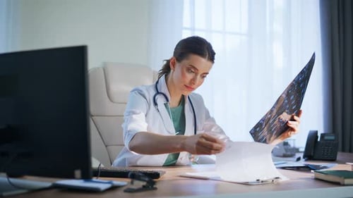 Satisfied Woman Radiologist Studying Scan Clinic Happy Doctor Analyzing Xray