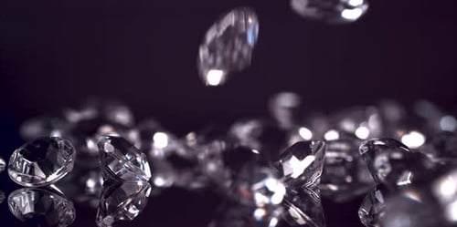 Diamonds Falling on a Shiny Surface in Slow Motion