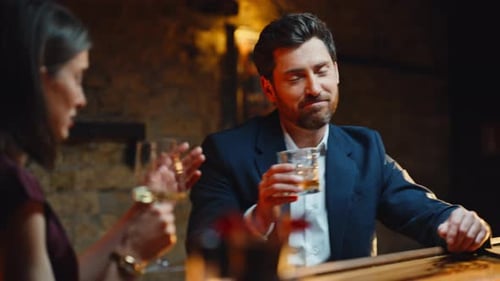 Man Drinking Alcohol Woman at Party Evening Closeup Pair Relaxing Night Bar