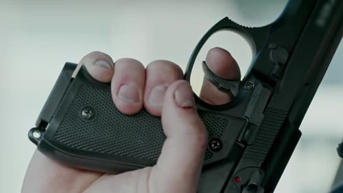 Nervous Man with Pistol Committing Suicide