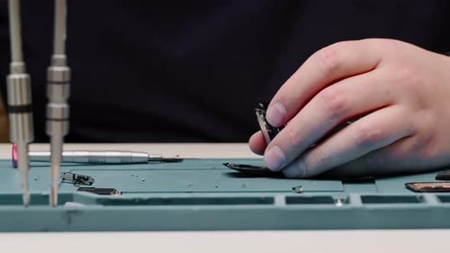 smart watch being repaired by an engineer Workshop for the repair of phones and equipment