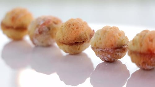 Walnut Shaped Cookies Lined Up Close Up