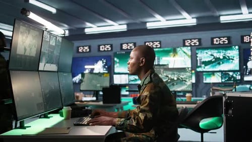 Intelligence Operative in Military Base Doing Surveillance with Radar