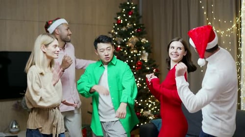 Friends Dancing at Christmas Party
