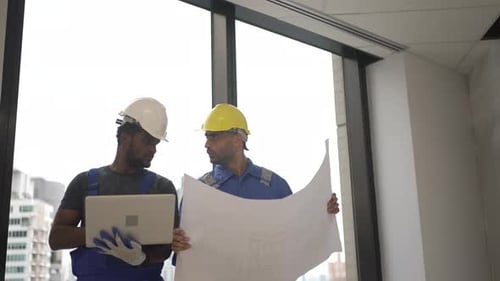 Engineers are working at tower.