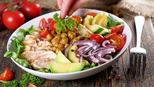 Preparing a Delicious Chicken Salad with Fresh Ingredients