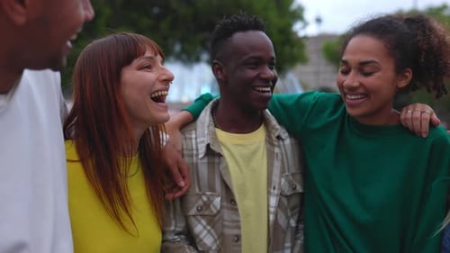 Diverse Group Laughing Together Outdoors