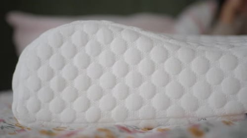 Close Up of White Textured Foam Bed Pillow