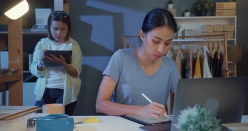 lady with casual look at tablet check order and stock inventory system prepare delivery.