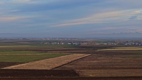 Drone Shot of Agricultural Plains and Village