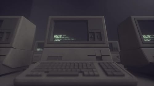Retro Computer Terminal Displaying Code in a Dark Vintage Tech Room