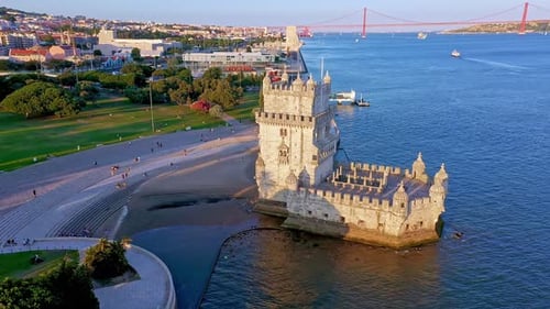 Drone Fly Around Belem Tower and River Lisbon Portugal on Sunny Day