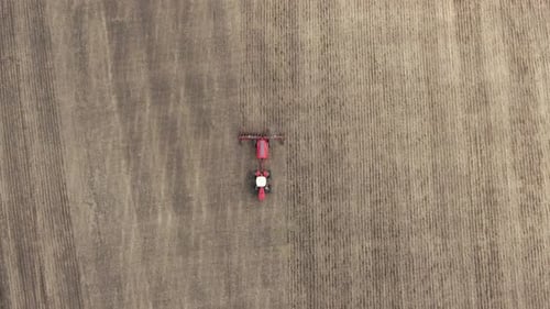 Plowed Field By Tractor