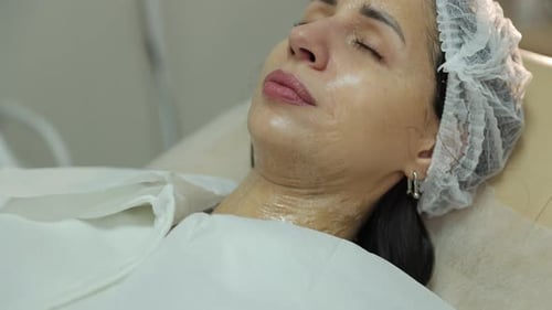 Woman Receiving Skin Rejuvenation Treatment at a Beauty Clinic