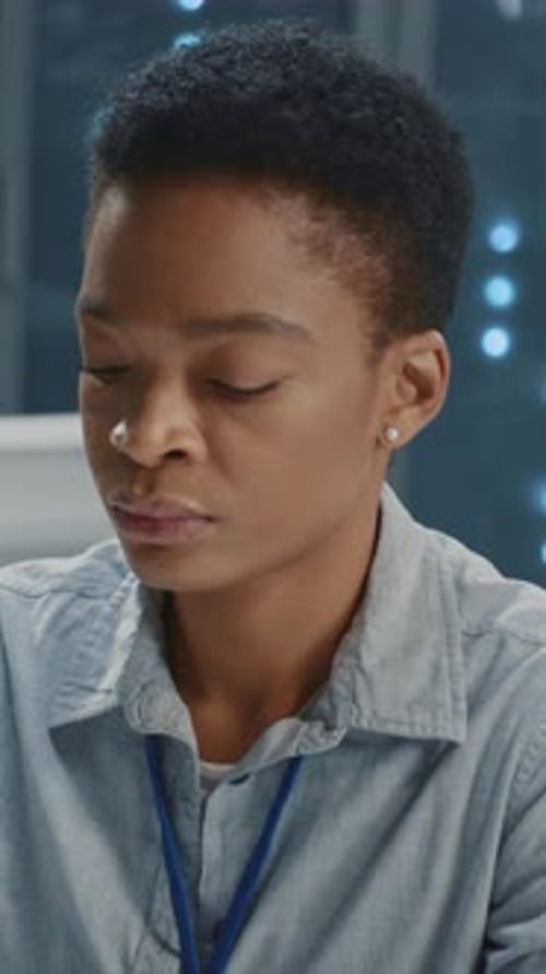 Smart Female IT Administrator Office Manager Using Computer Performing Financial Startup Analysis