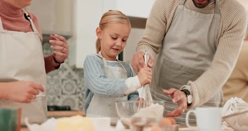 Family Cooking Together in Kitchen
