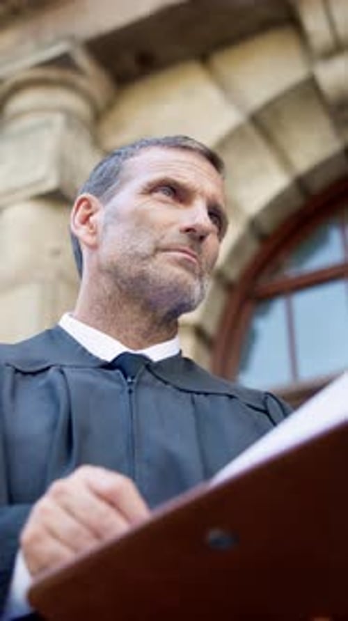 Judge, man and documents with thinking in city for court case, review and notes with legal career