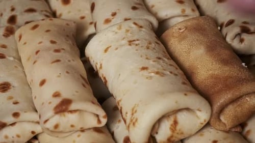 Close up of pancakes rolled and filled