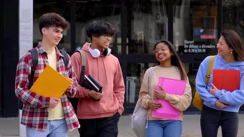 Group of Four Students Walking in a Campus University Outdoors Teenage Gen z Multiracial Classmate
