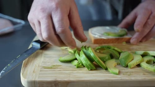 Preparing a Delicious Avocado Sandwich for Breakfast
