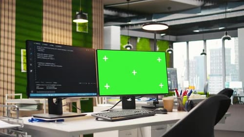 Mockup PC in Empty IT Startup Office Displaying Programming Languages
