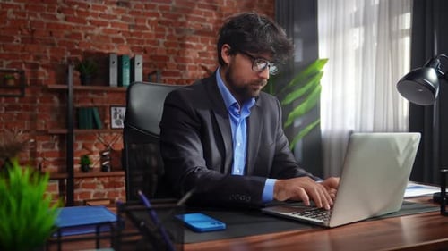 Business Professional Working in Modern Office Setting