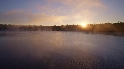 Golden Sunrise Over Misty Lake, Drone Aerial View