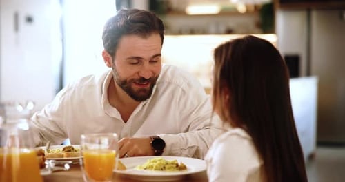 Talking, food or father with child at breakfast for healthy meal, care or drink for love in family
