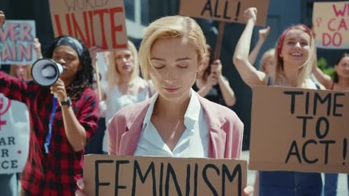 Diverse Group of Young Adults Rallies for Feminism