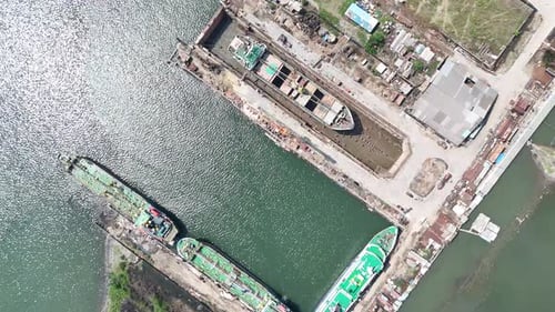 Shipyard Aerial View with Reflections and Industrial Activity Scene