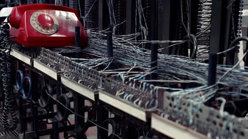 Vintage Telephone Exchange Station - Connection Wires and Red Old Telephone
