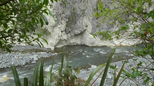 Majestic river carving through a scenic gorge landscape.