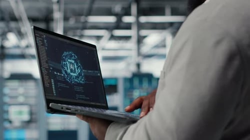 Close Up of Server Hub Admin Using Tablet to Do Infrastructure AI Automatization
