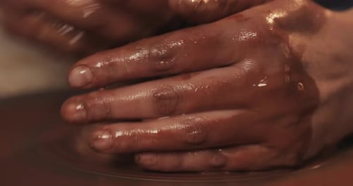 Potter Makes Pottery From Clay Close Up Making Ceramic Products From Red Clay Twisted Potter's Wheel