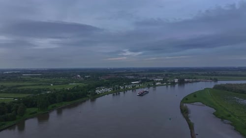 Aerial View Of Ship Cruising In The River In Barendrecht, Netherlands - Drone Shot