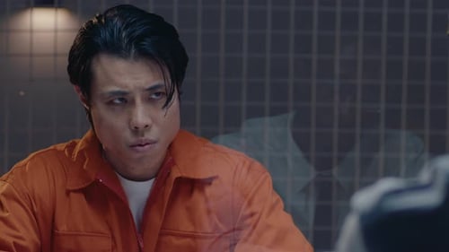 Asian Prisoner Having Meeting with Detective in Visiting Room