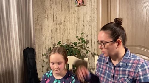 Child Learning Keyboard with Musical Accompaniment