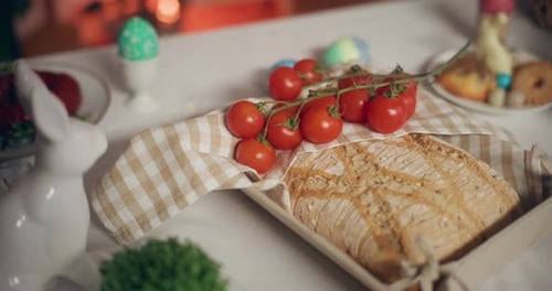 Rustic Loaf Bread and Cherry Tomatoes on Table